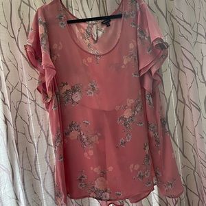 Torrid Woman’s floral blouse